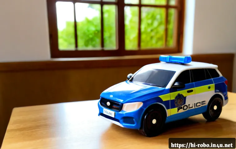 로보카폴리 중고 장난감 - Photorealistic close-up of a gently used blue-and-white children’s rescue police car toy with small ...
